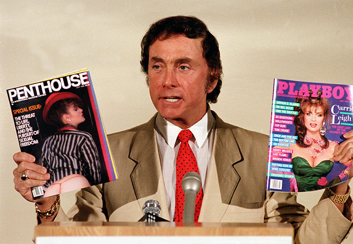 Bob Guccione Dies: Bob Guccione holds up his magazine Penthouse and Playboy magazine 