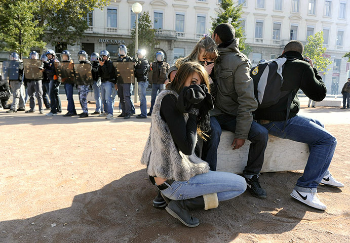 France Strike Update: Youths protect themselves as they face riot Police in Lyon