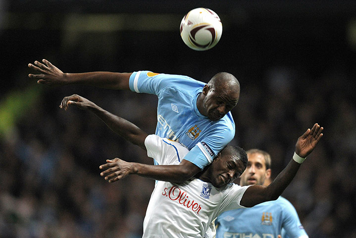Europa League: City's midfielder Patrick Vieira beats Poznan'sforward Joel Tshibamba
