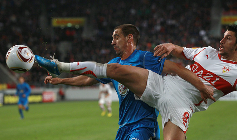 Europa League: Stuttgart's Ciprian Marica sticks out a long leg to divert the ball away 