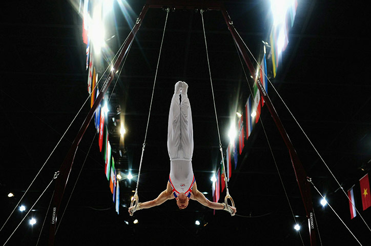 24 Hours in Pictures: Daniel Pervis of Great Britain competes on the Rings