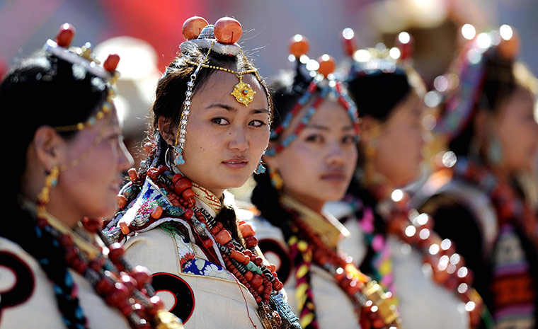 24 hours: Qamdo, Tibet: Women dressed in traditional Tibetan costume