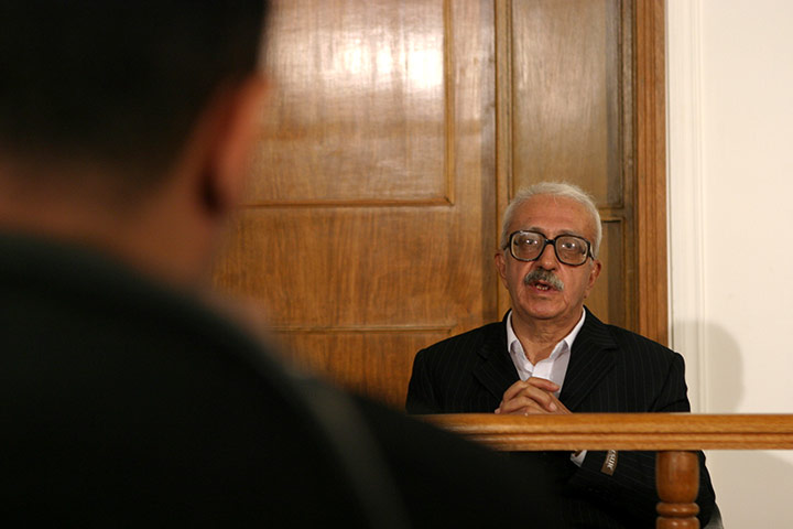 Tariq Aziz: Tariq Aziz appears in court in 2004