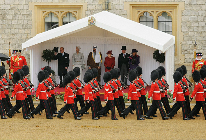 Emir of Qatar state visit: Reviewing a Guard of Honour during their visit Windsor Castle 