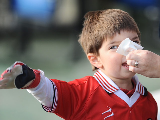 FC United: The FC United of Manchester mascot has his nose wiped