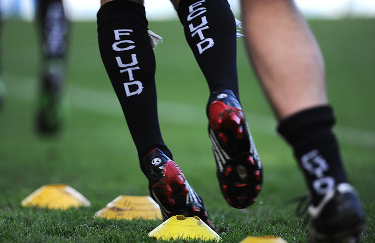 FC United: FC United of Manchester sock detail during the pre match warm up
