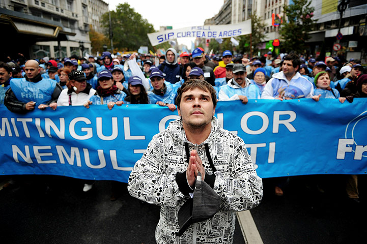 24 hours in pictures: Romanian trade union members march against austerity measures