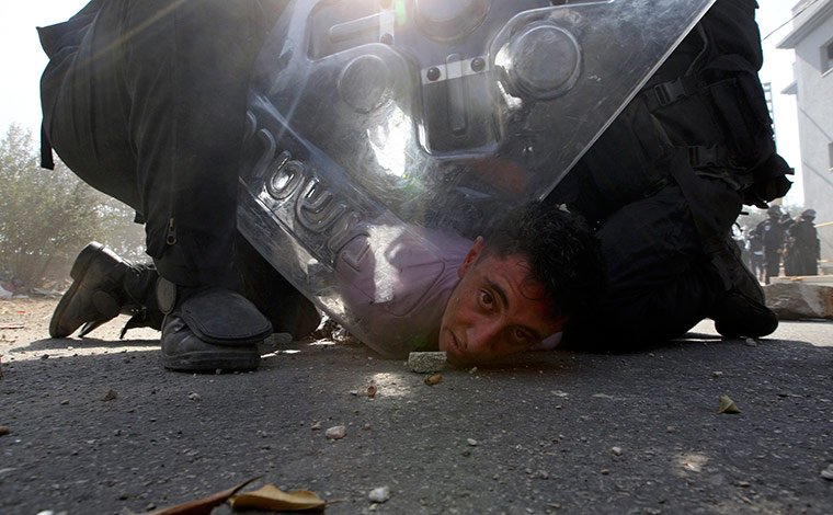 Israel Protest: Israeli police restrain a protester during clashes in Umm el-Fahm