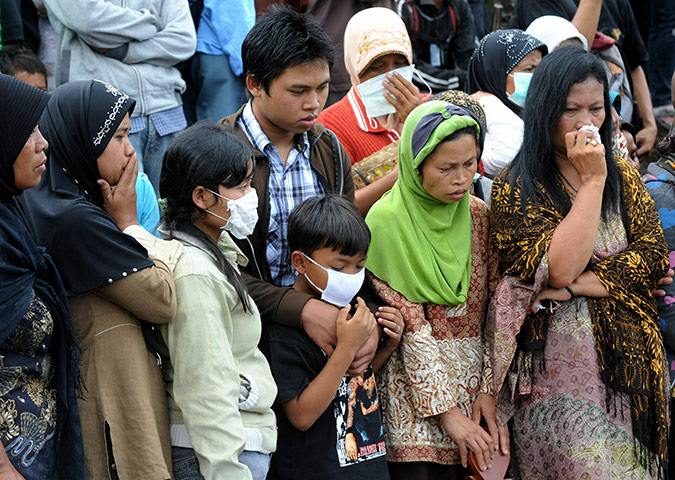 Indonesia Disaster : Indonesian residents and relatives of victims