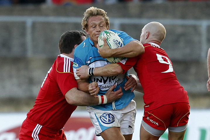 2003 RWC winners: Toulon's Jonny Wilkinson is tackled Munster's Peter Stringer & John Hayes