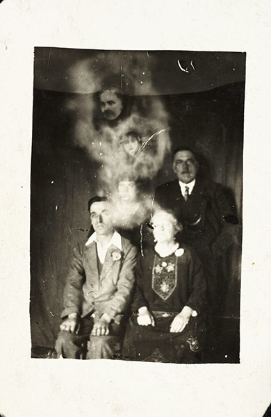 William Hope ghost pics: Family group with two spirits