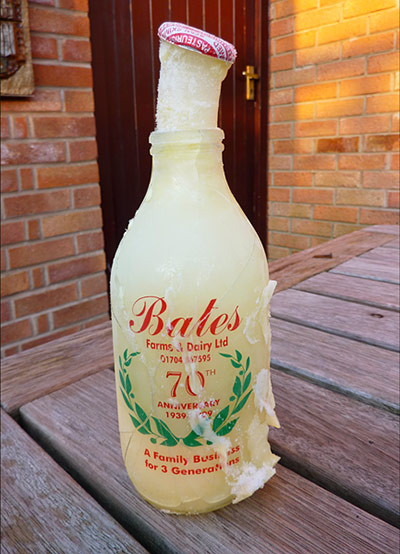 In Pictures: cold: Frozen milk bottle