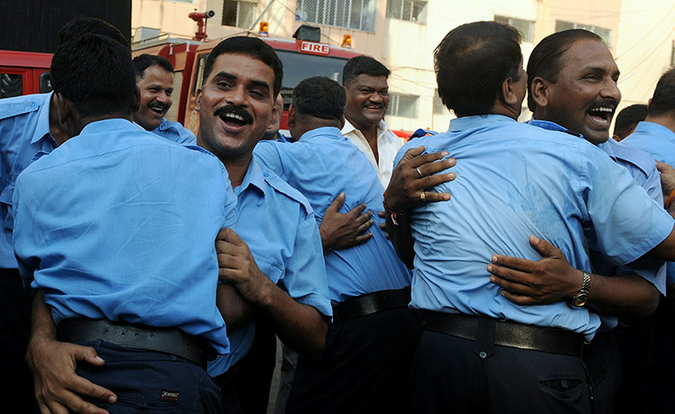 24 hours in pictures: Indian fire brigade laughter therapy