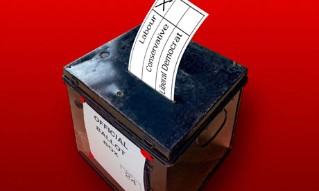 British election ballot box with voting slip going into the slot