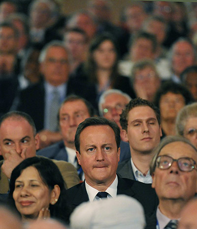 Conservatives day 1: Prime Minister Cameron listens from the crowd 