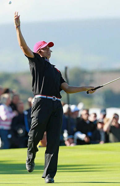 Ryder Cup Day 4: Rickie Fowler of the USA throws his ball after halving his match Ryder Cup