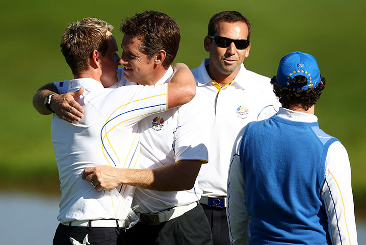 Ryder Cup Day 4: Europe's Lee Westwood congratulates Luke Donald after his singles match