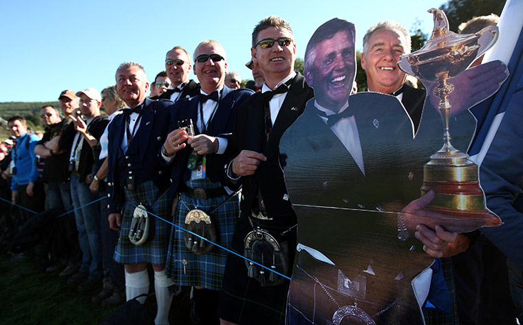 Ryder Cup Day 4: Fans stand with a cardboard cut out of European Captain Colin Montgomerie