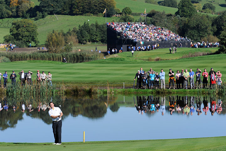 Ryder Cup 4 Jenkins: Lee Westwood chips onto the 12th green Ryder Cup 2010 day four