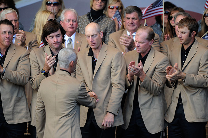 Ryder Cup Day 4: American captain Corey pavin shakes hands with his team Ryder Cup 2010 