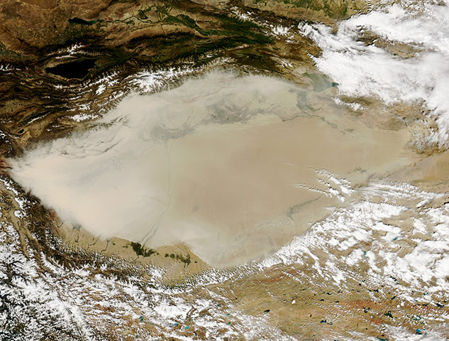 Satellite Eye on Earth  Dust storm over China's Taklimakan Desert 