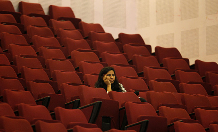 CWG Day 2: A sole spectator doesn't seem too interested in the weightlifting events
