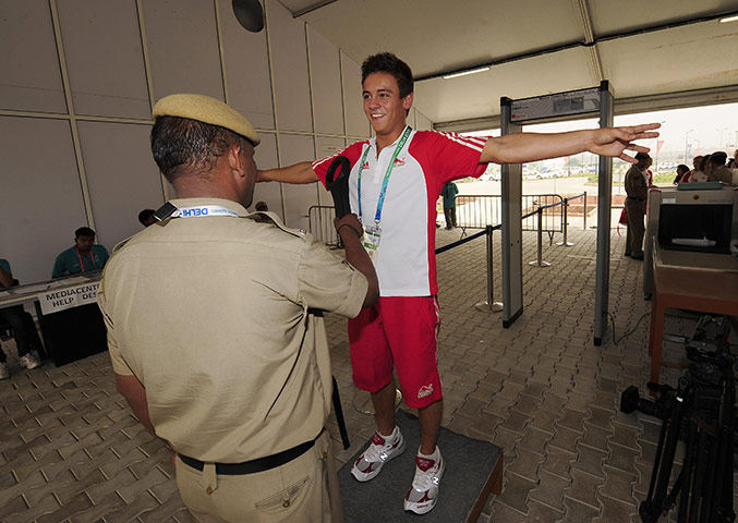 Commonwealth Games Day 4: Tom Daley goes through security screening arriving at Commonwealth Games
