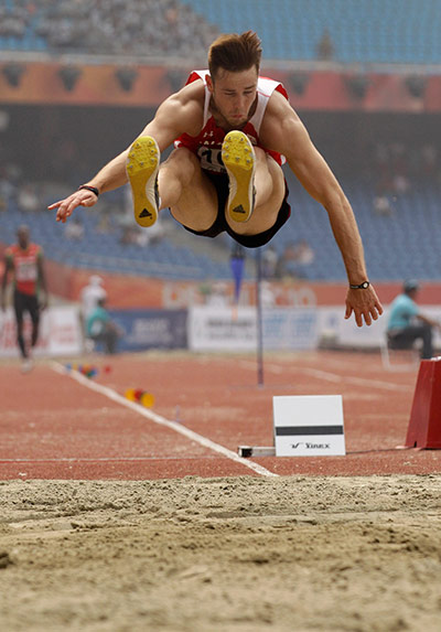 Commonwealth Games Day 4: Ben Gregory competes in the Decathlon Long Jump Commonwealth Games