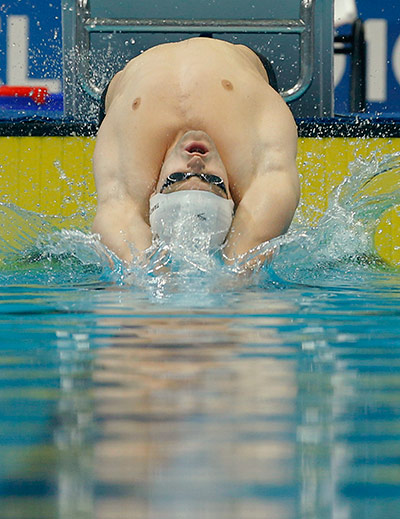 Commonwealth Games Day 4: Liam Tancock 100m backstroke heat Commonwealth Games
