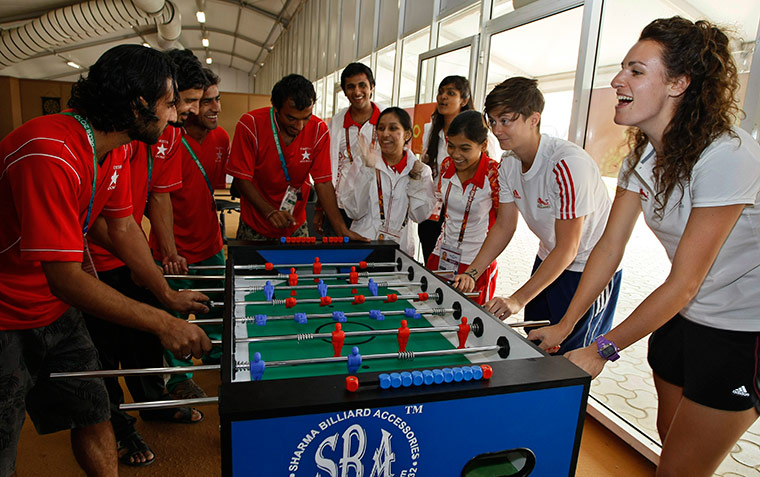 Commonwealth Games Day 4: England's contingent, in white, play with Pakistani players commonwealth