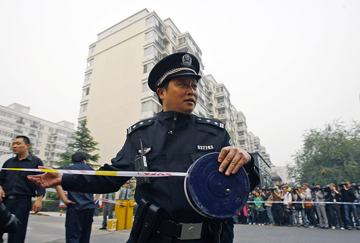 Liu Xiaobo Nobel Peace: Chinese police officer seals off a road near Liu Xia's apartment