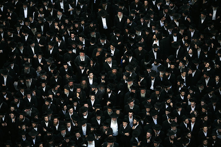 24hours: Ultra-Orthodox Jews attend the funeral for a Torah scroll 
