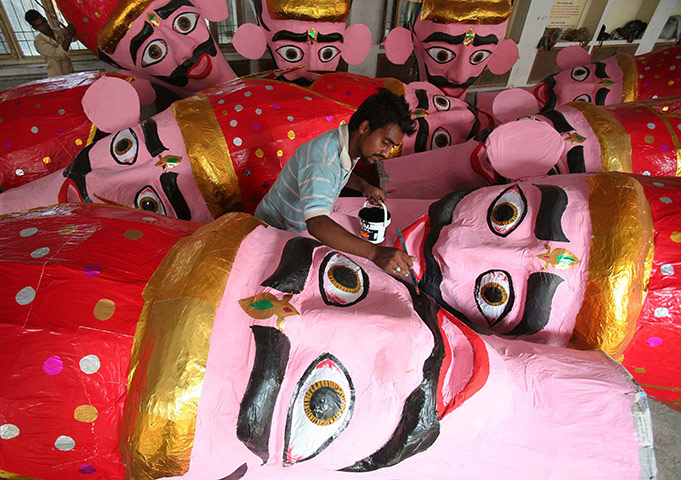 24hours: An artisan gives finishing touches to an effigy of demon king Ravana