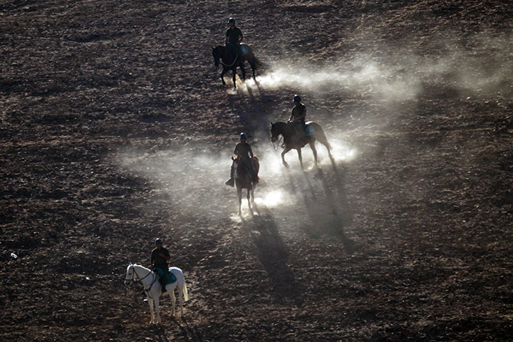 24hours: San Jose, Chile: Mounted police patrol the perimeter around the mine near