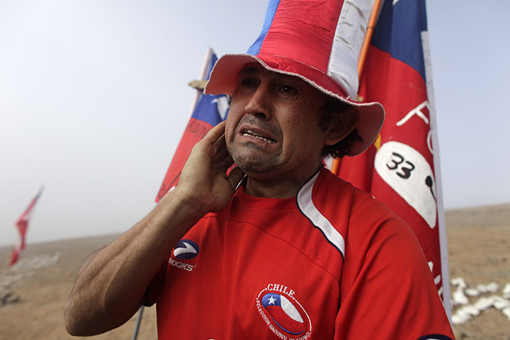 Chile Miners Rescue: A man weeps at the San Jose Mine near Copiapo, Chile