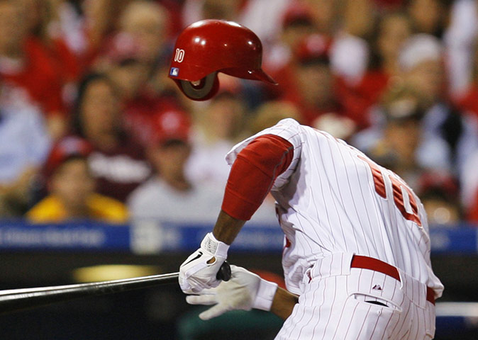 24 hours in pictures: Francisco reacts after being hit in the head by a pitch