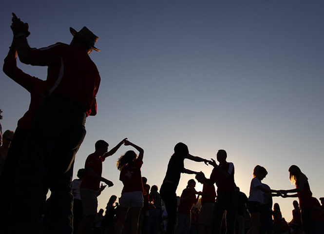 24 hours in pictures: Tailgaters dance