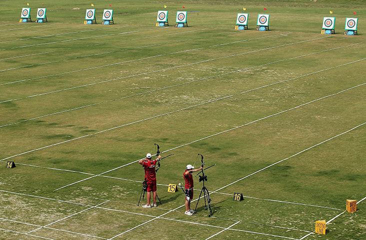 CWG Day 6: Duncan Busby and Christopher White warm up before Archery final