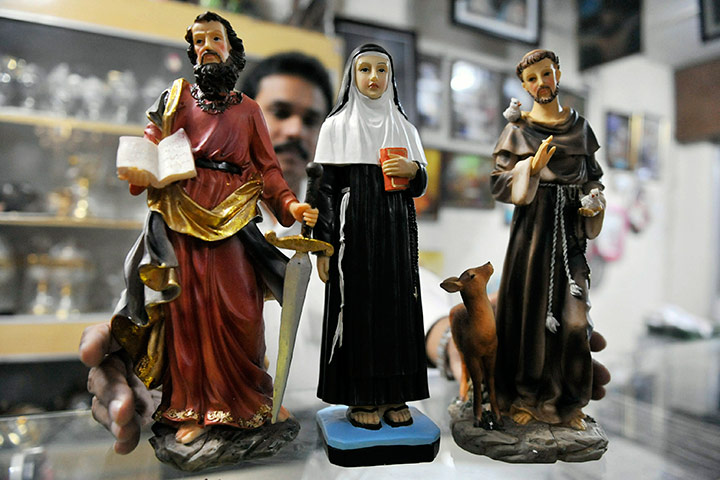 All saints day: Statues of Saints Paul, Philomena and Francis at Christian Art Gallery