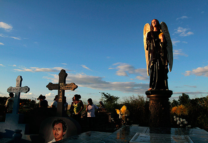 All saints day: People visit the graves of deceased relatives at a cemetery in Managua