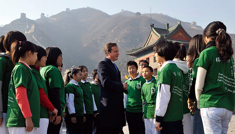David Cameron in China: David Cameron meets with Chinese school children at the Great Wall north