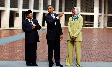 U.S. President Barack Obama and first lady Michelle Obama tour the Istiqlal Mosque in Jakarta