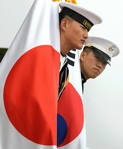 G20 Seoul: South Korean military honour guards carry Japanese flags