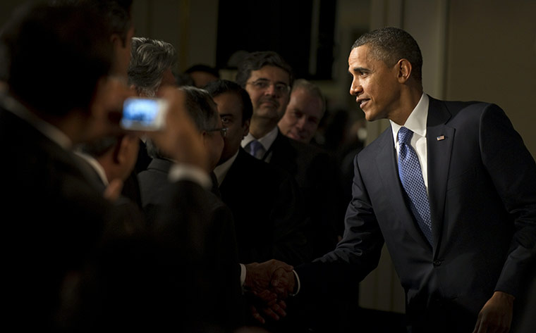 Week in Business: US President Barack Obama greets the crowd in Mumbai
