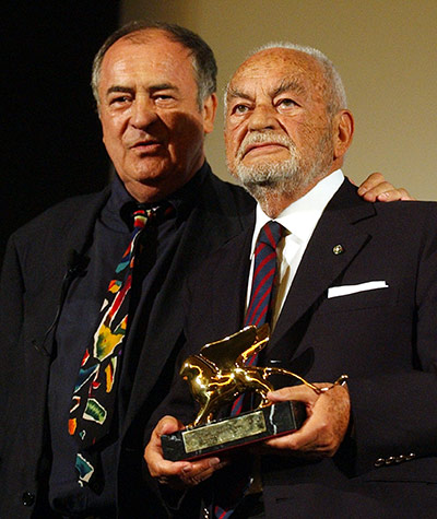 Dino Di Laurentiis: Dino de Laurentiis, right, holds the Golden Lion awarded for his career