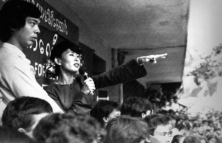 Aung San Suu Kyi release: 1989: Aung San Suu Kyi gestures while addressing peoples rally in Rangoon