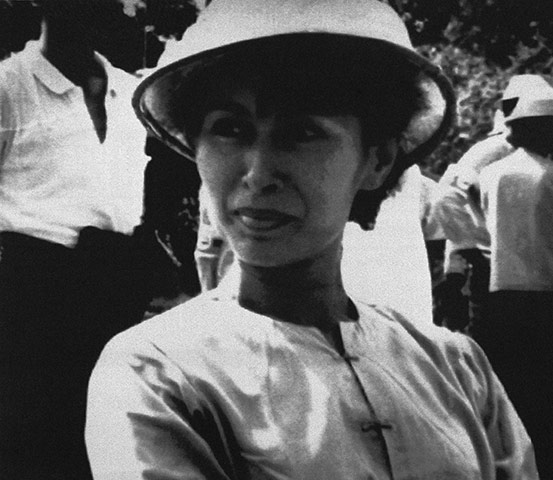 Aung San Suu Kyi release: 1989: Aung San Suu Kyi, wearing a bamboo hat
