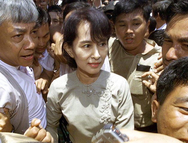 Aung San Suu Kyi release: 2002: Aung San Suu Kyi is mobbed by supporters