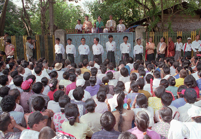 Aung San Suu Kyi release: 1996: Aung San Suu Kyi delivers a speech outside her home in Rangoon