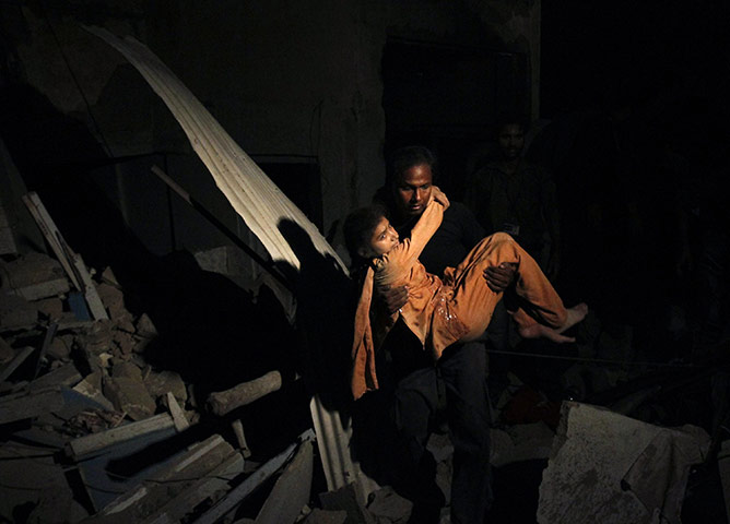 24 hours in pictures: suicide bomb blast in Karachi